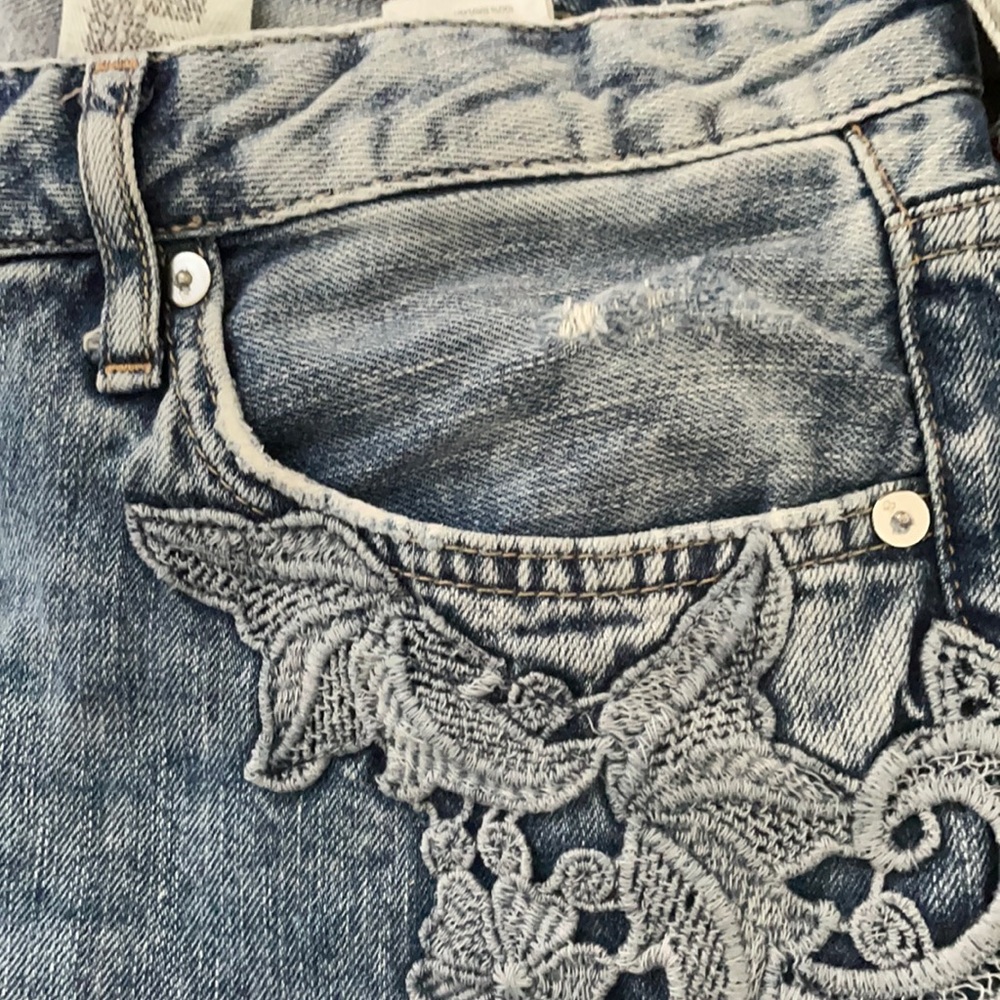 Unique jeans and pretty detail. Great condition.